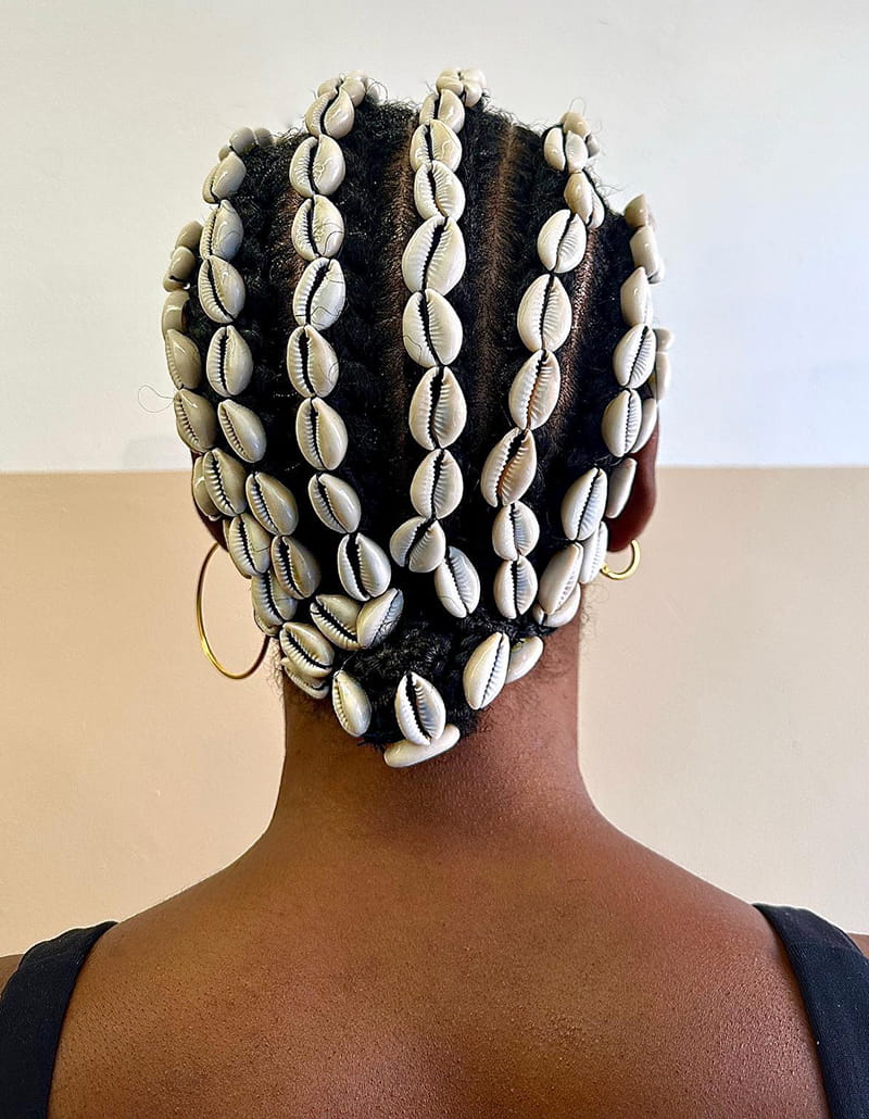 Braids and cowrie shells