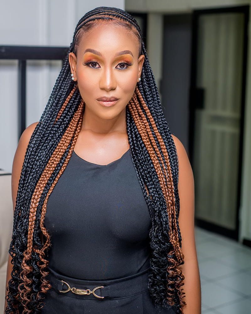 Woman Wearing Fulani Peekaboo Braids Hairstyle