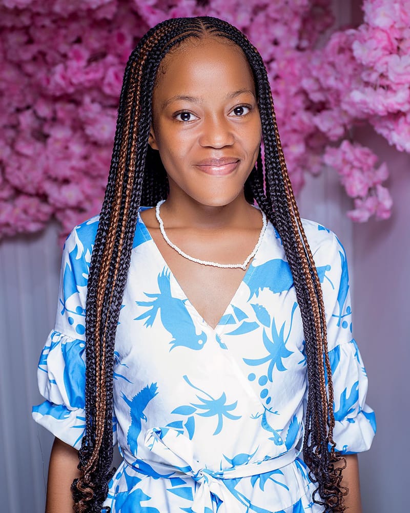 Woman Wearing Fulani Peekaboo Braids Hairstyle