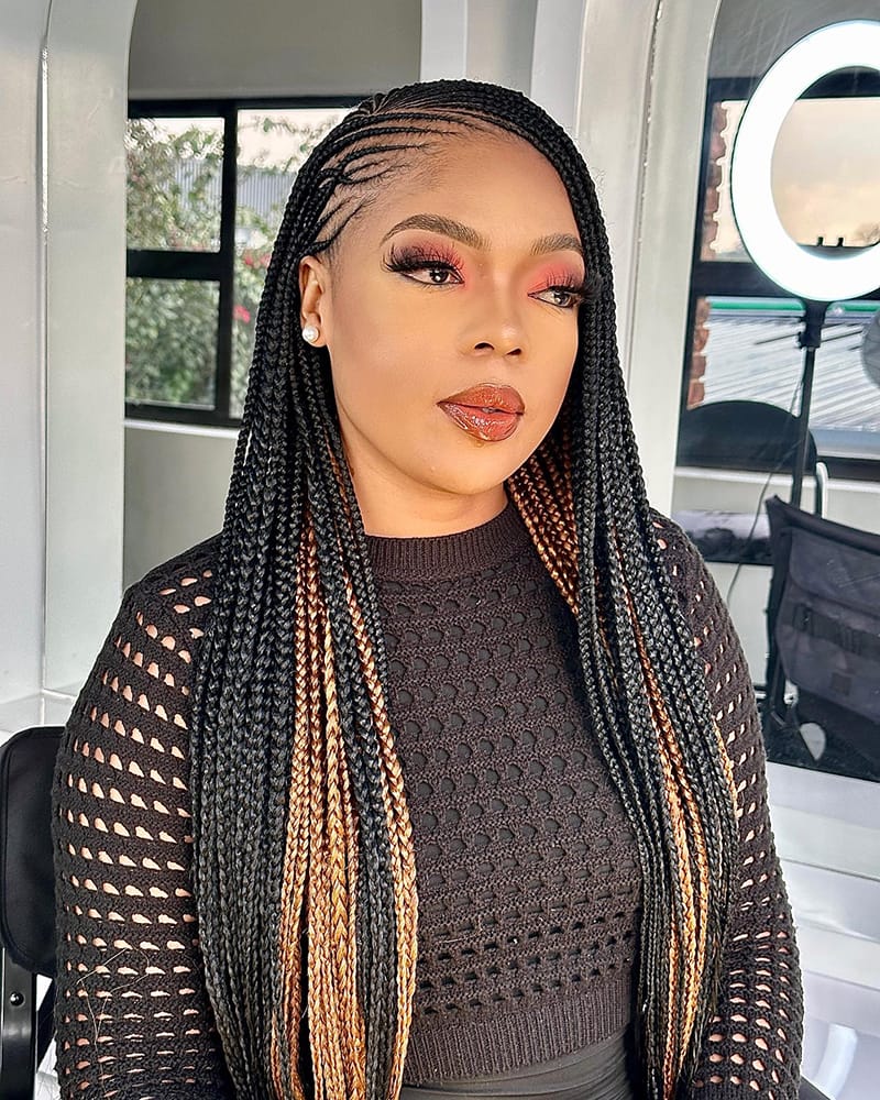 Woman Wearing Fulani Peekaboo Braids Hairstyle