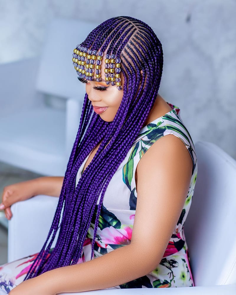 Woman Wearing a beautiful Tribal Braids Hairstyle