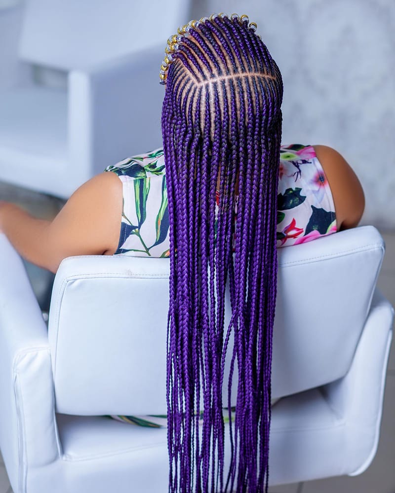 Woman Wearing a beautiful Tribal Braids Hairstyle