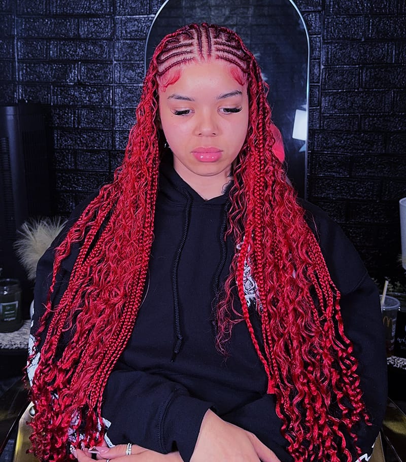 Woman wearing Red Fulani Tribal Braids Hairstyles.