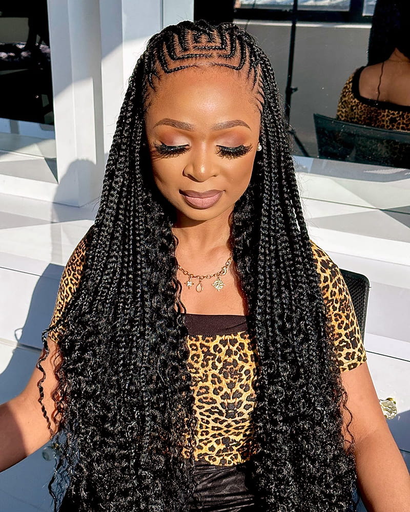 African-American Woman wearing U-Shaped Goddess Braids. The Braid Style is actually a Fulani style.