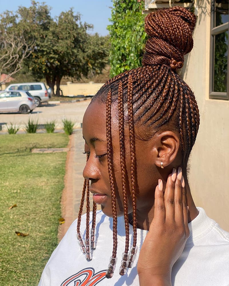 African Brown Cornrow Braid Hairstyles with Topknot