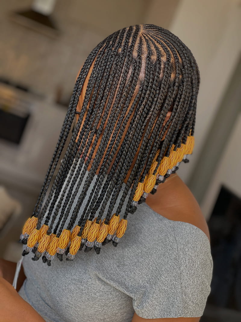 Top View of Asymmetrical Fulani Braids with a Deep Side Part