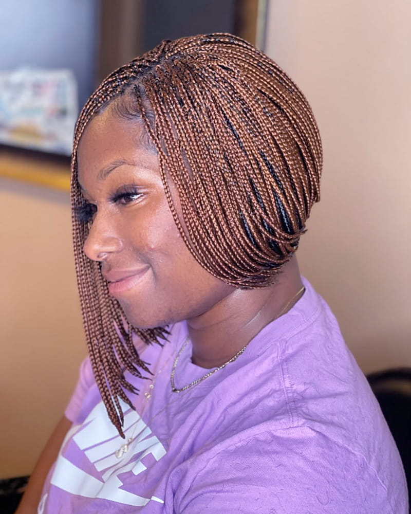 Asymmetric pixie braid bob with short braided sections