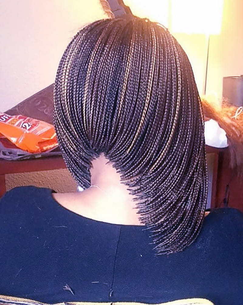 Short asymmetrical braided pixie bob hairstyle for Black women
