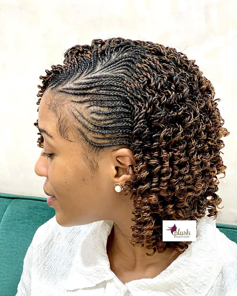 Curly pixie braids with cornrowed sides and a short braided finish