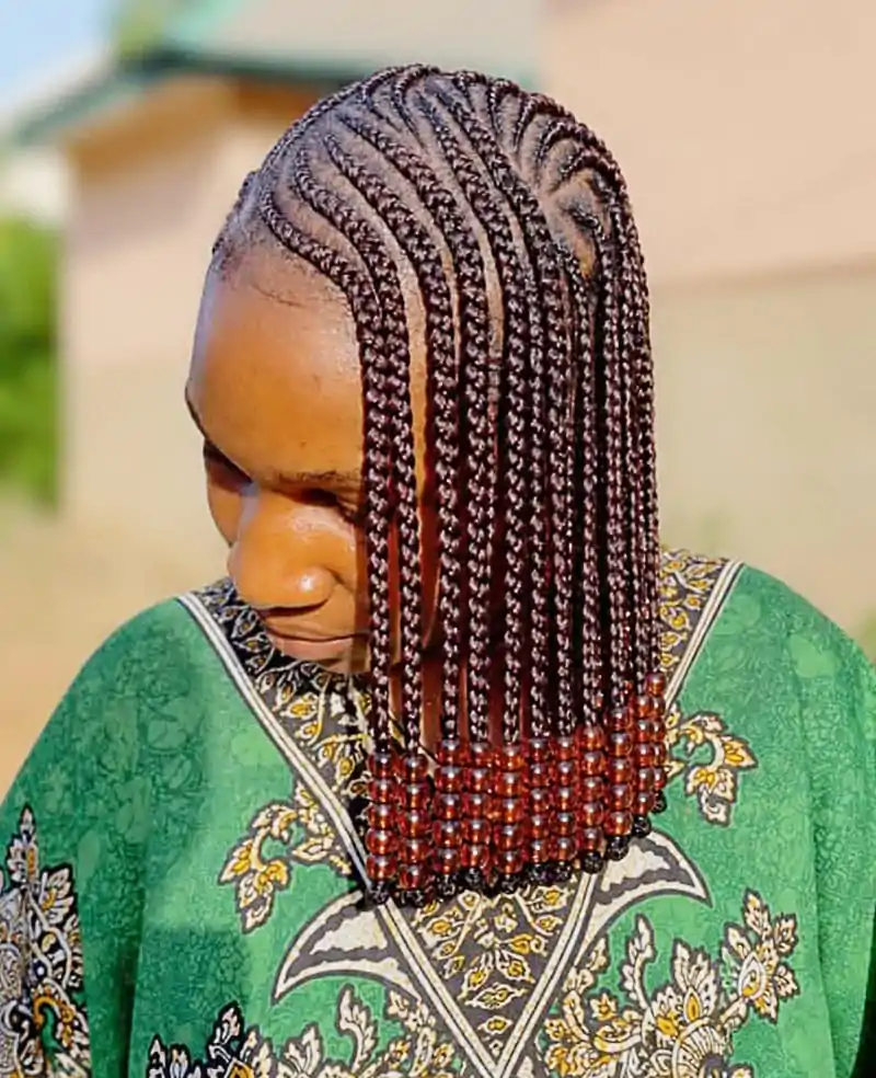 Layered feed-in braid bob decorated with beads