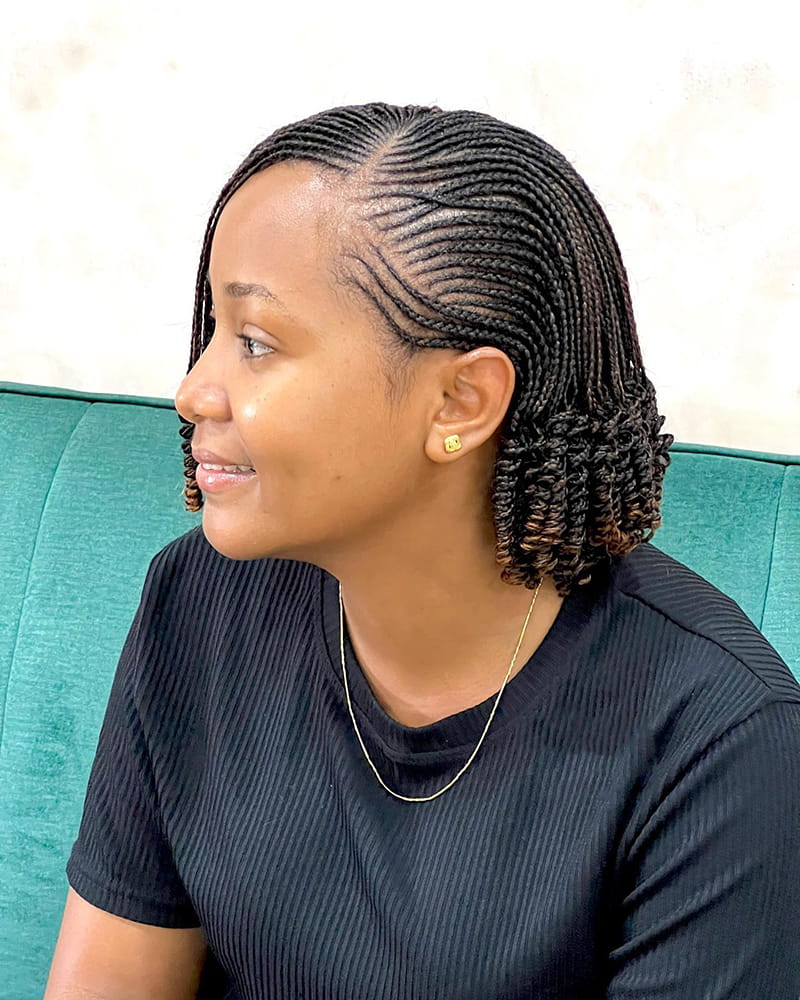 Micro twist pixie bob with short, neat braids for a chic look side view