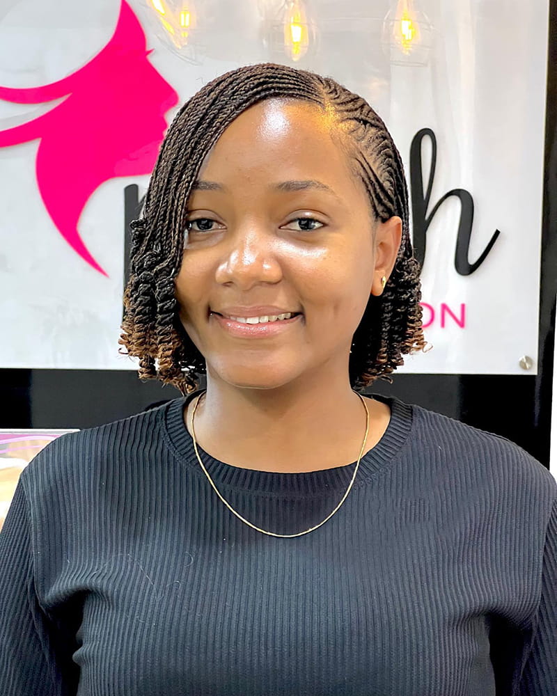 Micro twist pixie bob with short, neat braids for a chic look front view