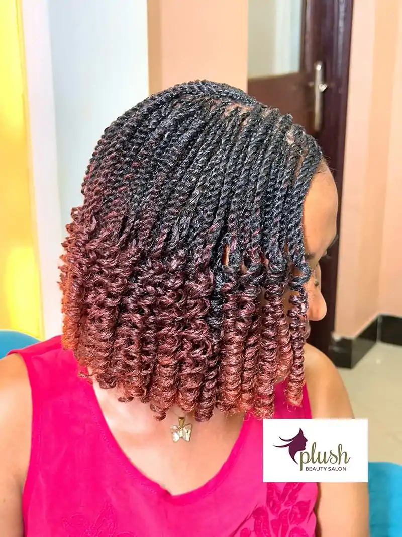 Side-swept spring twist pixie bob with a stylish short shape