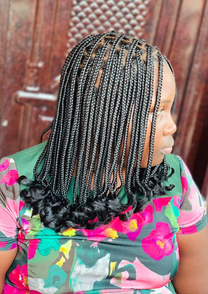 Small pixie braid bob with curled ends and compact braids